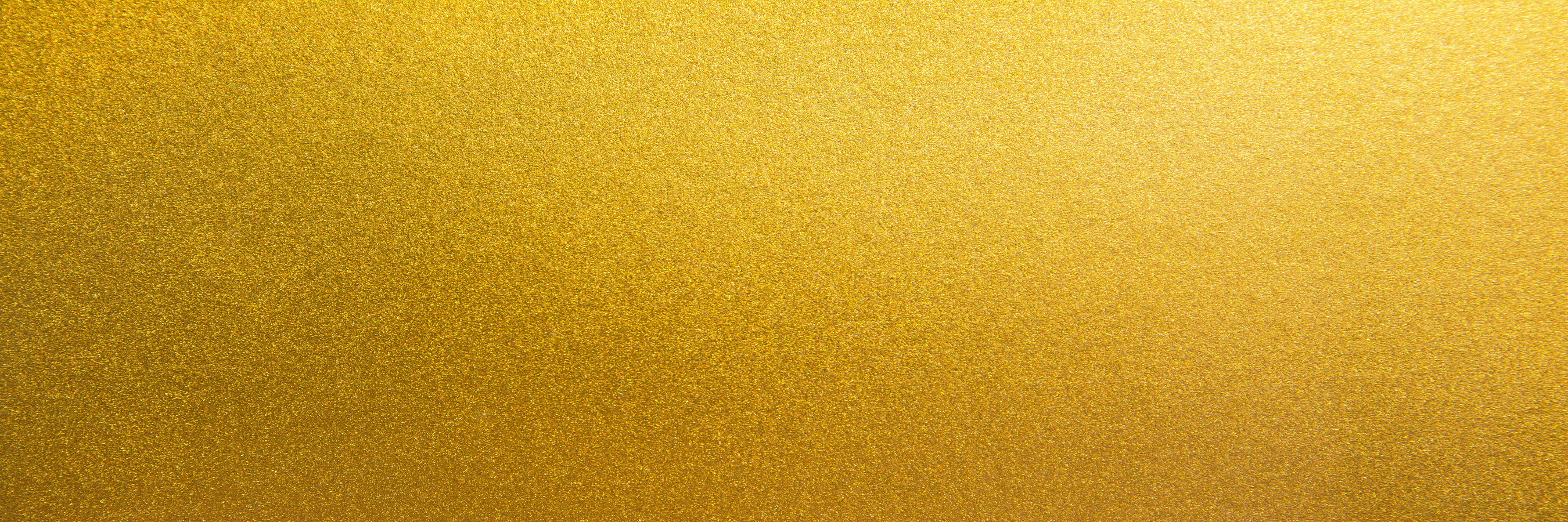 Metal texture background in gold.Panorama gold texture